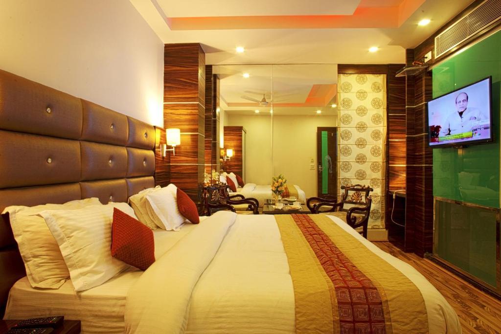 Hotel Delhi 55 -City Center New Delhi Rum bild