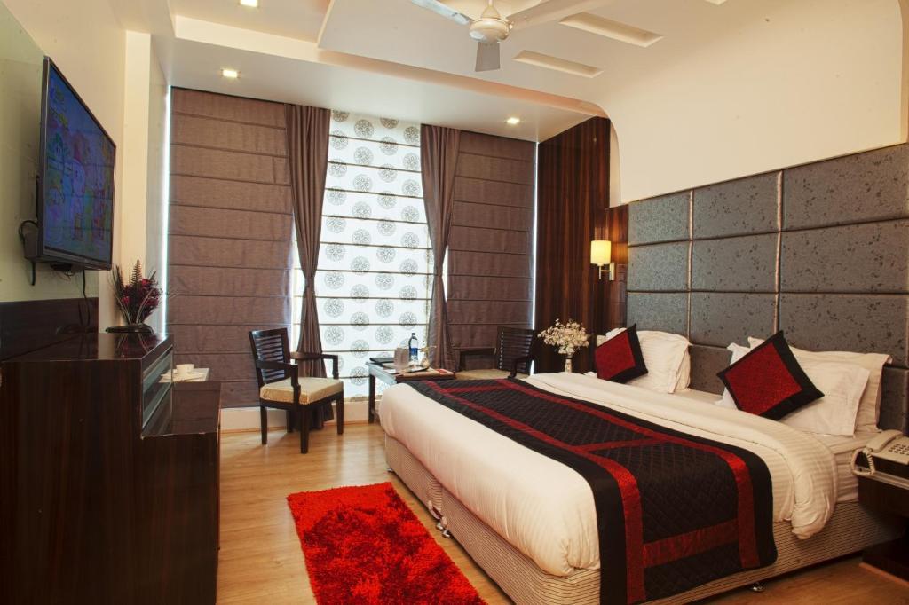Hotel Delhi 55 -City Center New Delhi Rum bild
